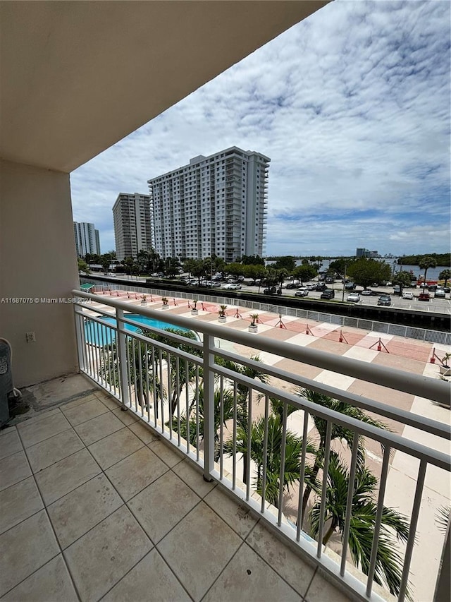 balcony featuring view of pool