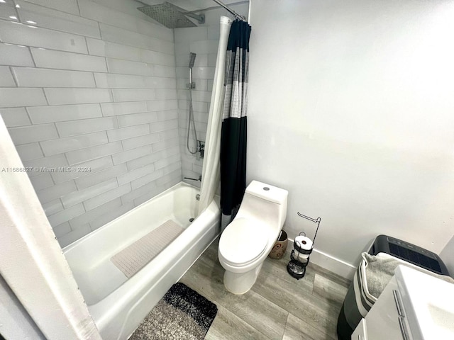 full bathroom featuring toilet, shower / bath combination with curtain, vanity, and wood-type flooring