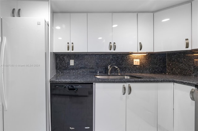 kitchen with sink, dishwasher, white cabinets, and white fridge