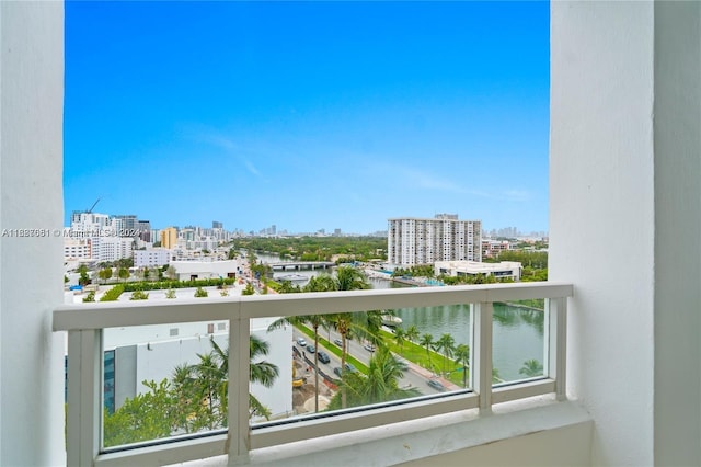 balcony featuring a water view