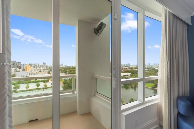 4401 Collins Ave Unit 1214, Miami Beach, FL 33140 - unfurnished sunroom with a city view and a water view
