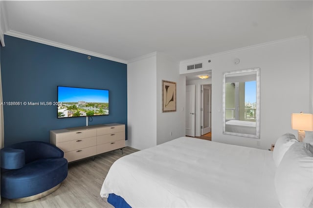 4401 Collins Ave Unit 1214, Miami Beach, FL 33140 - bedroom with crown molding, wood finished floors, and multiple windows