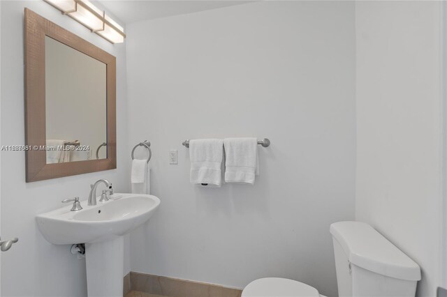 4401 Collins Ave Unit 1214, Miami Beach, FL 33140 - bathroom featuring toilet