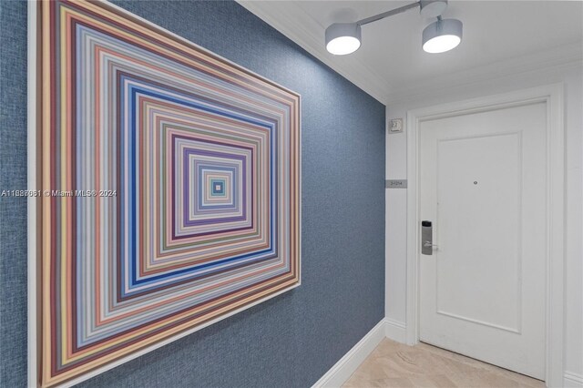 4401 Collins Ave Unit 1214, Miami Beach, FL 33140 - hallway featuring baseboards and crown molding