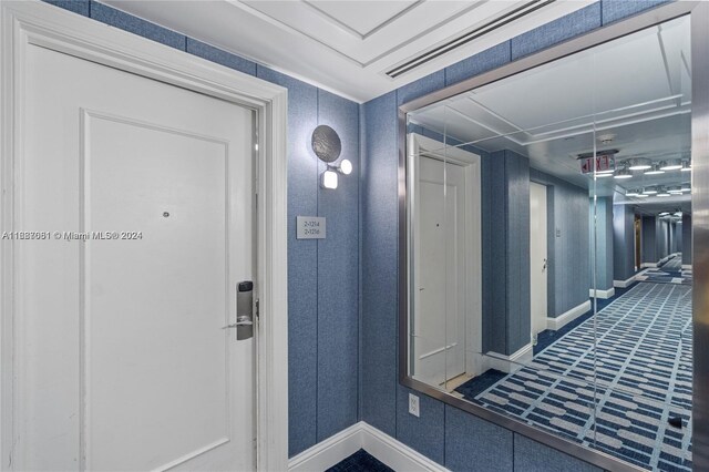 4401 Collins Ave Unit 1214, Miami Beach, FL 33140 - hallway featuring baseboards