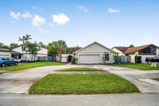 ranch-style home with a front yard and a garage