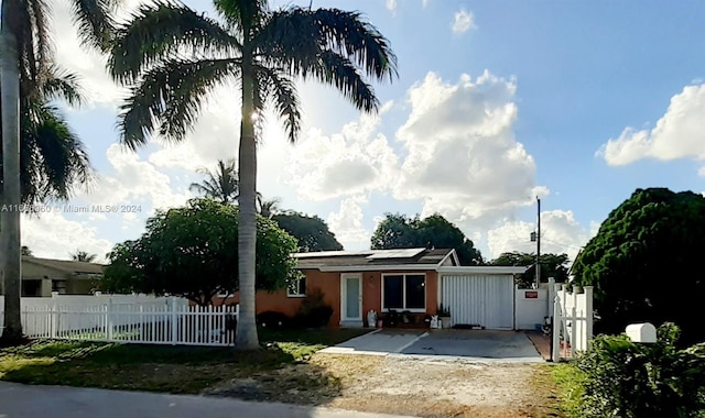 view of front of home with solar panels