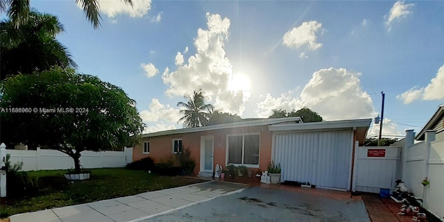 rear view of house with a lawn