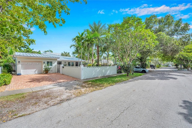 view of front of property with a garage