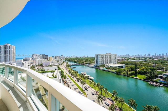 balcony featuring a water view