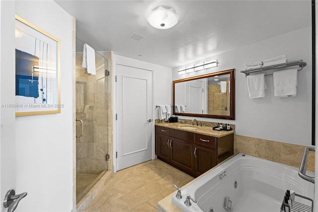 bathroom featuring vanity, plus walk in shower, and tile patterned flooring