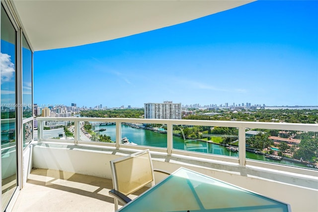 balcony featuring a water view