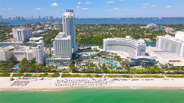 drone / aerial view with a view of the beach and a water view