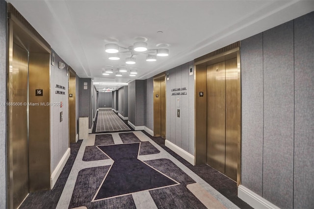 hallway featuring elevator