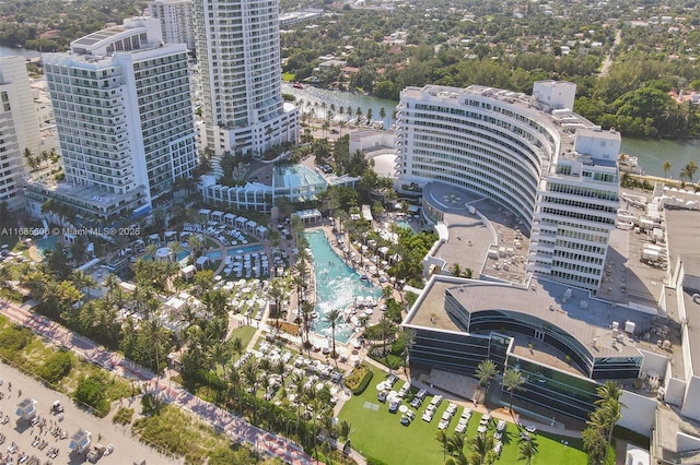 birds eye view of property with a water view