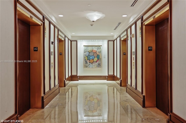 hallway featuring elevator