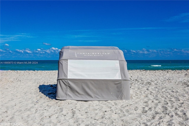 view of water feature with a beach view