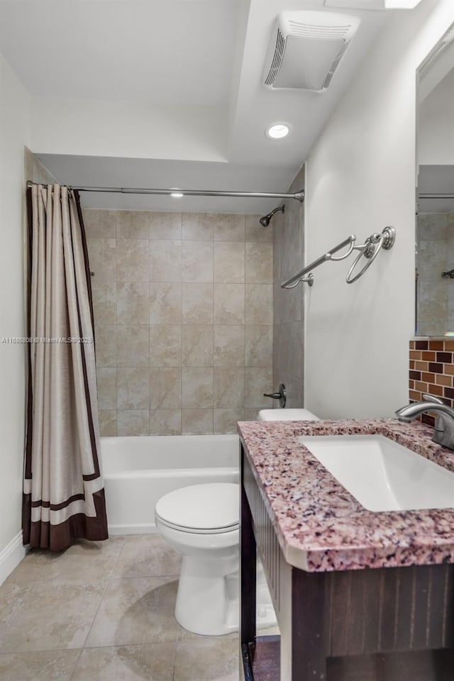 full bathroom featuring vanity, backsplash, tile patterned flooring, toilet, and shower / tub combo