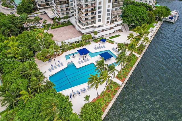 birds eye view of property with a water view