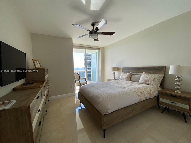 bedroom featuring access to outside, light tile patterned flooring, and ceiling fan