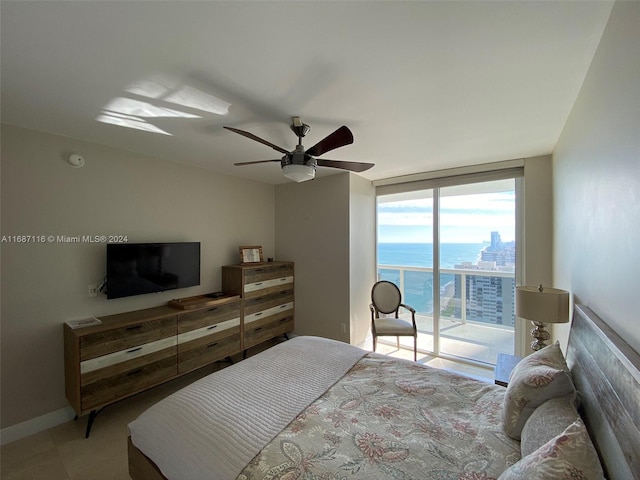 bedroom featuring access to outside and ceiling fan