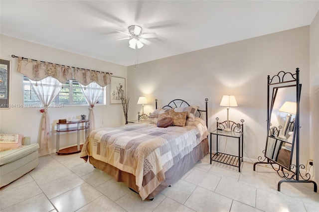 tiled bedroom with ceiling fan