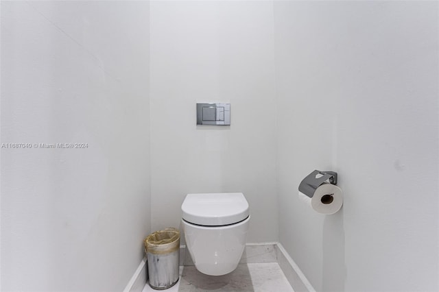 bathroom featuring toilet