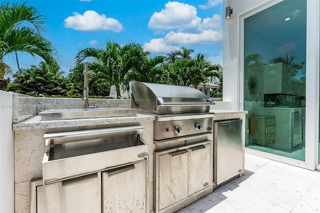 view of patio with a grill and area for grilling