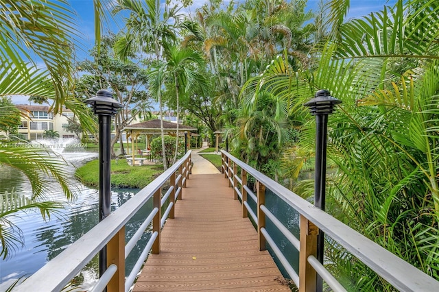 dock area with a water view and a gazebo