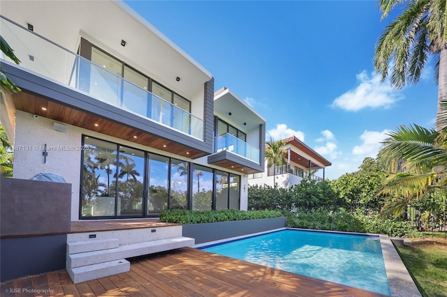 view of pool featuring a deck