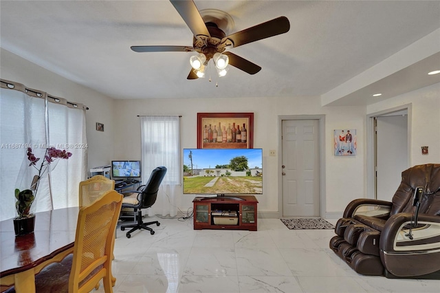 office space featuring ceiling fan