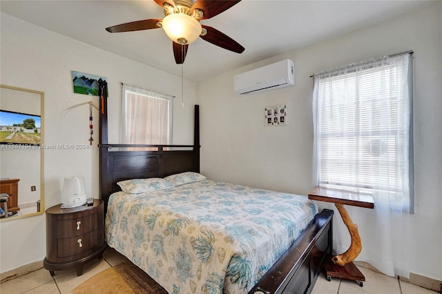 bedroom with ceiling fan, light tile patterned floors, and a wall mounted air conditioner