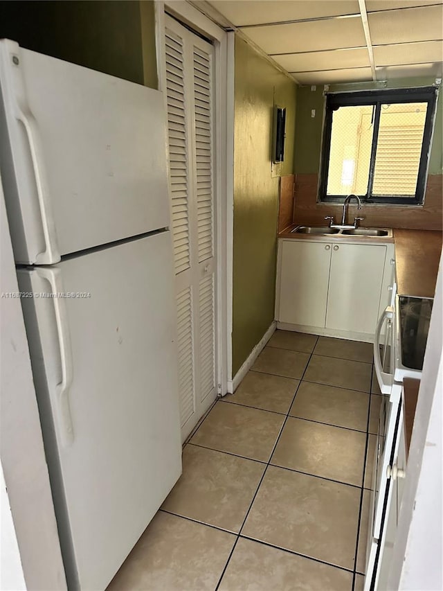 interior space featuring vanity and tile patterned flooring