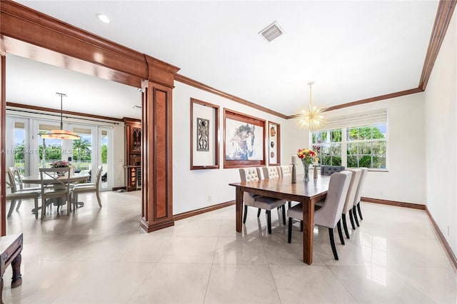 tiled dining space featuring french doors, a chandelier, and crown molding