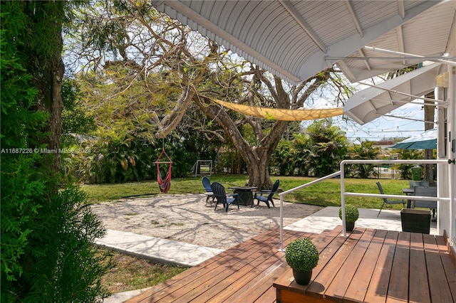 view of patio featuring an outdoor fire pit