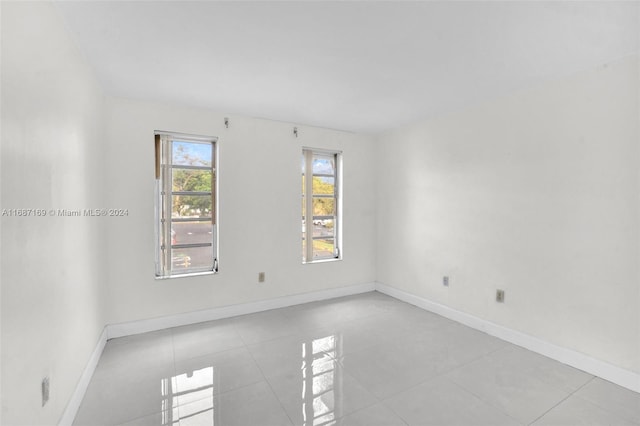 view of tiled spare room