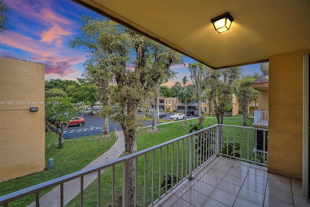 view of balcony at dusk