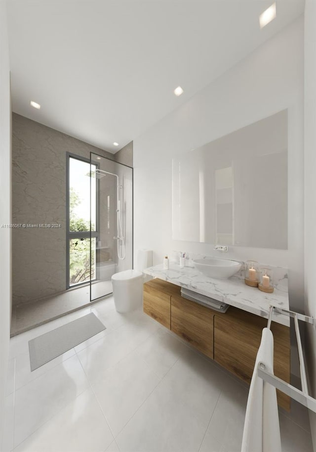 bathroom with vanity, walk in shower, and tile patterned floors