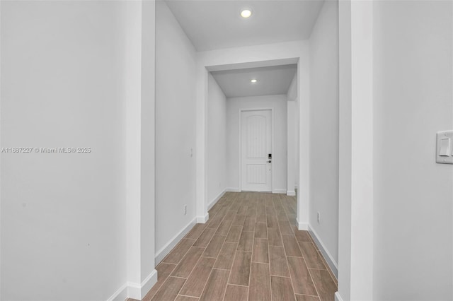 hallway featuring hardwood / wood-style floors