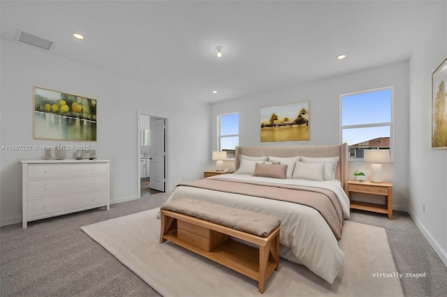 bedroom with light colored carpet