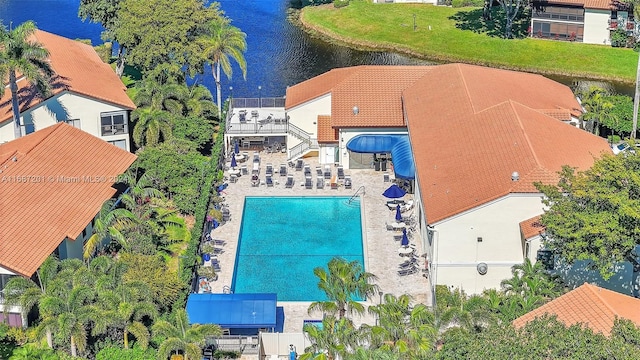 birds eye view of property featuring a water view