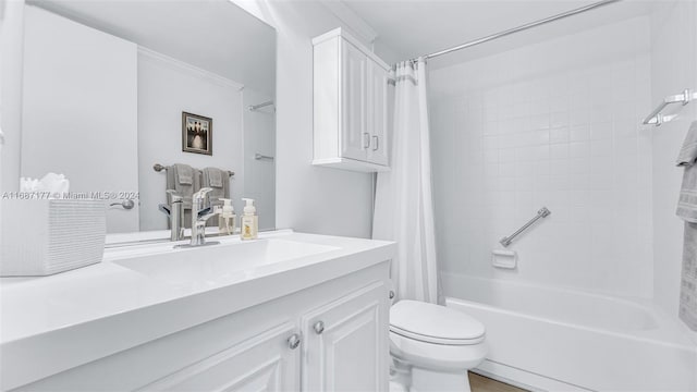 full bathroom with vanity, toilet, and shower / bath combo with shower curtain