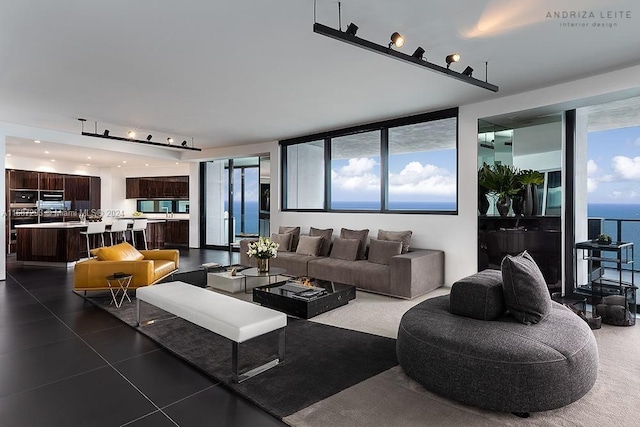 living room featuring a water view