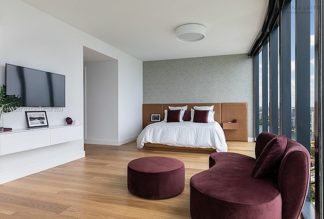 bedroom featuring hardwood / wood-style flooring