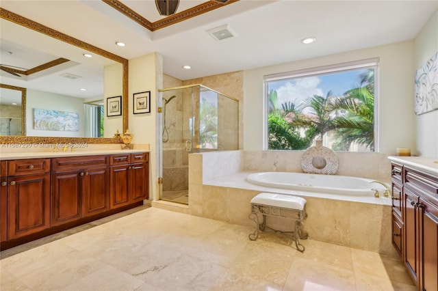 bathroom featuring vanity, ornamental molding, and shower with separate bathtub