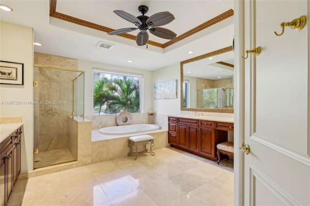 bathroom with vanity, shower with separate bathtub, and ceiling fan