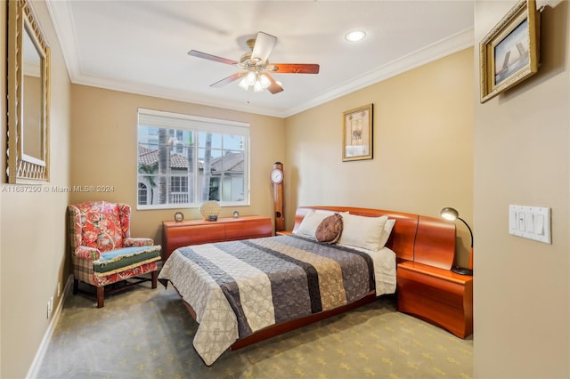 carpeted bedroom featuring ceiling fan and ornamental molding