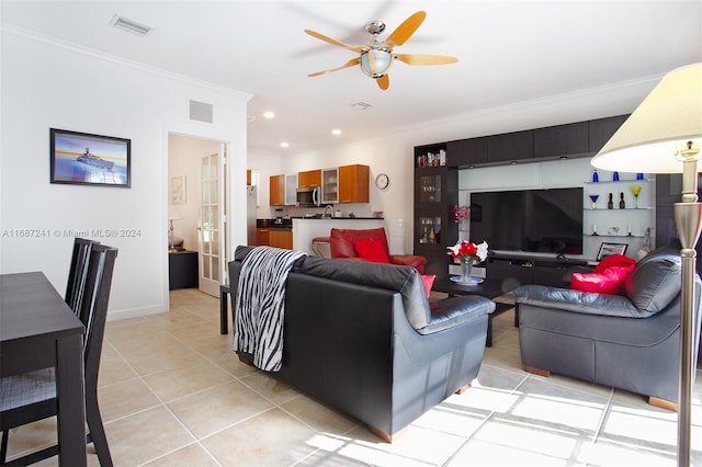 tiled living room with crown molding and ceiling fan