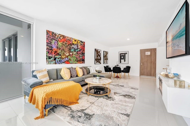 living room with light tile patterned floors