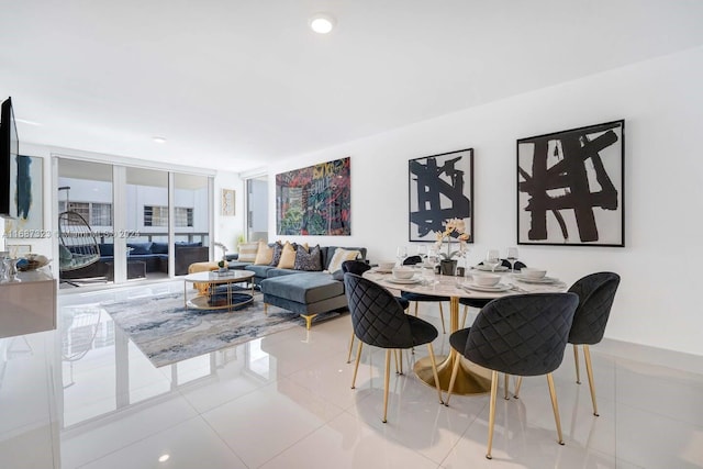 tiled dining area with expansive windows